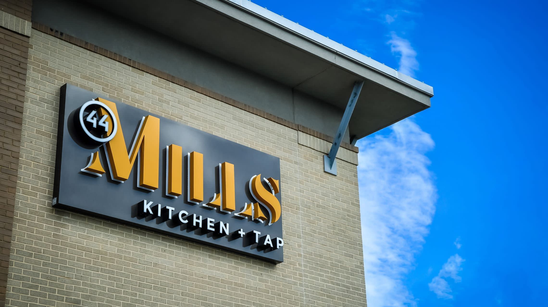 restaurant sign on exterior building