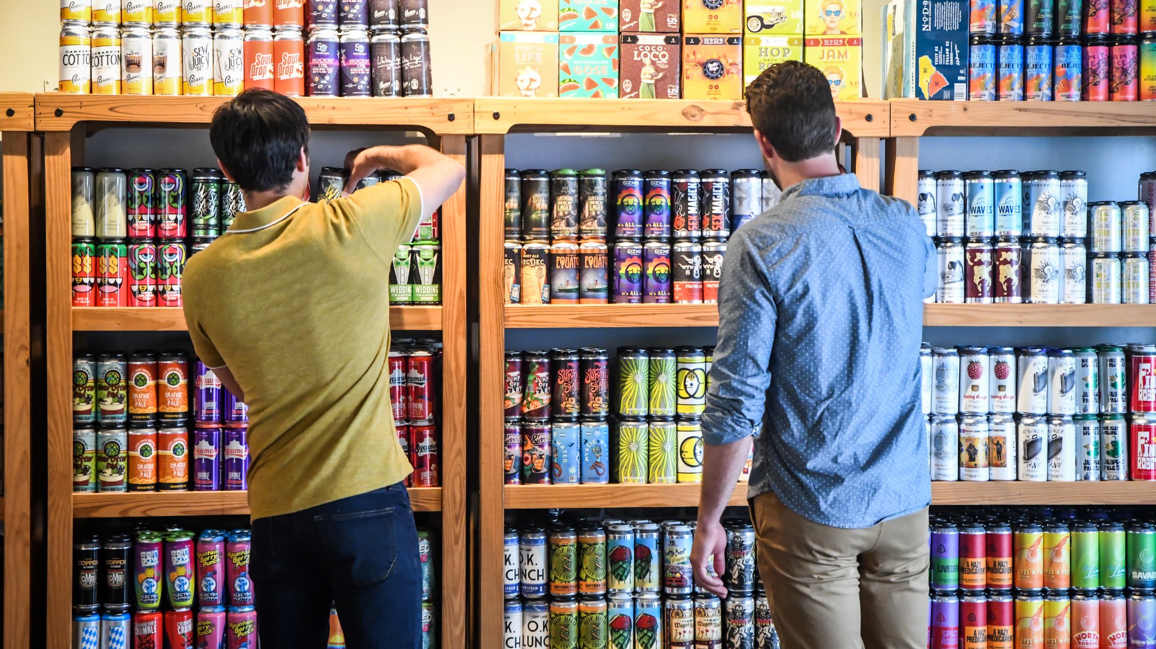 two men shopping for beer