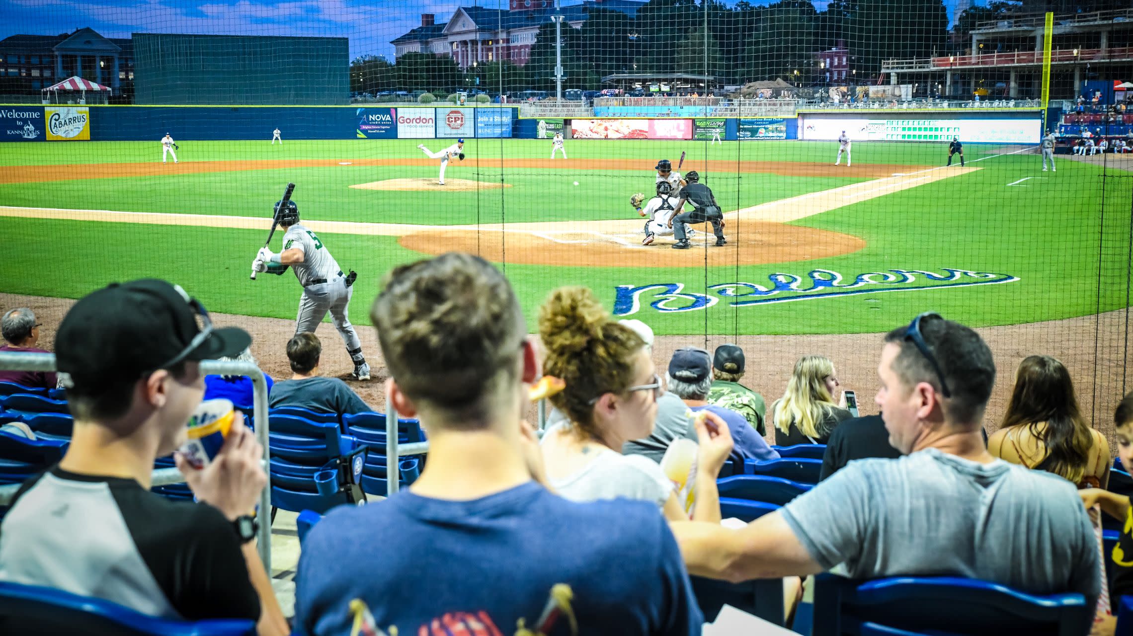 spectators watching baseball game