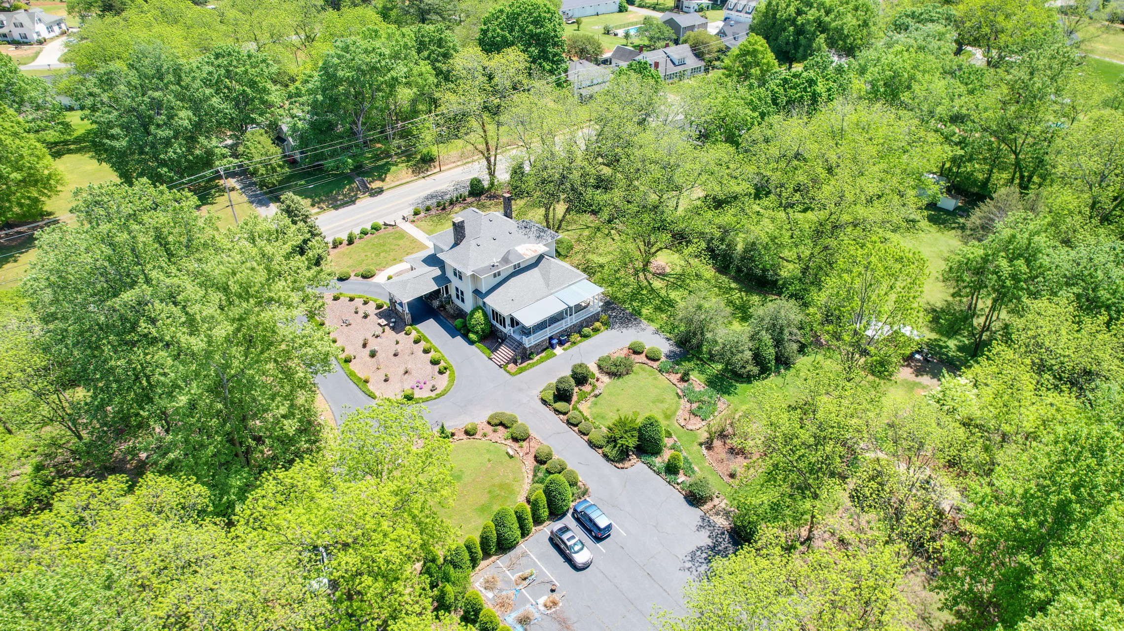 Ariel view of home and parking lot