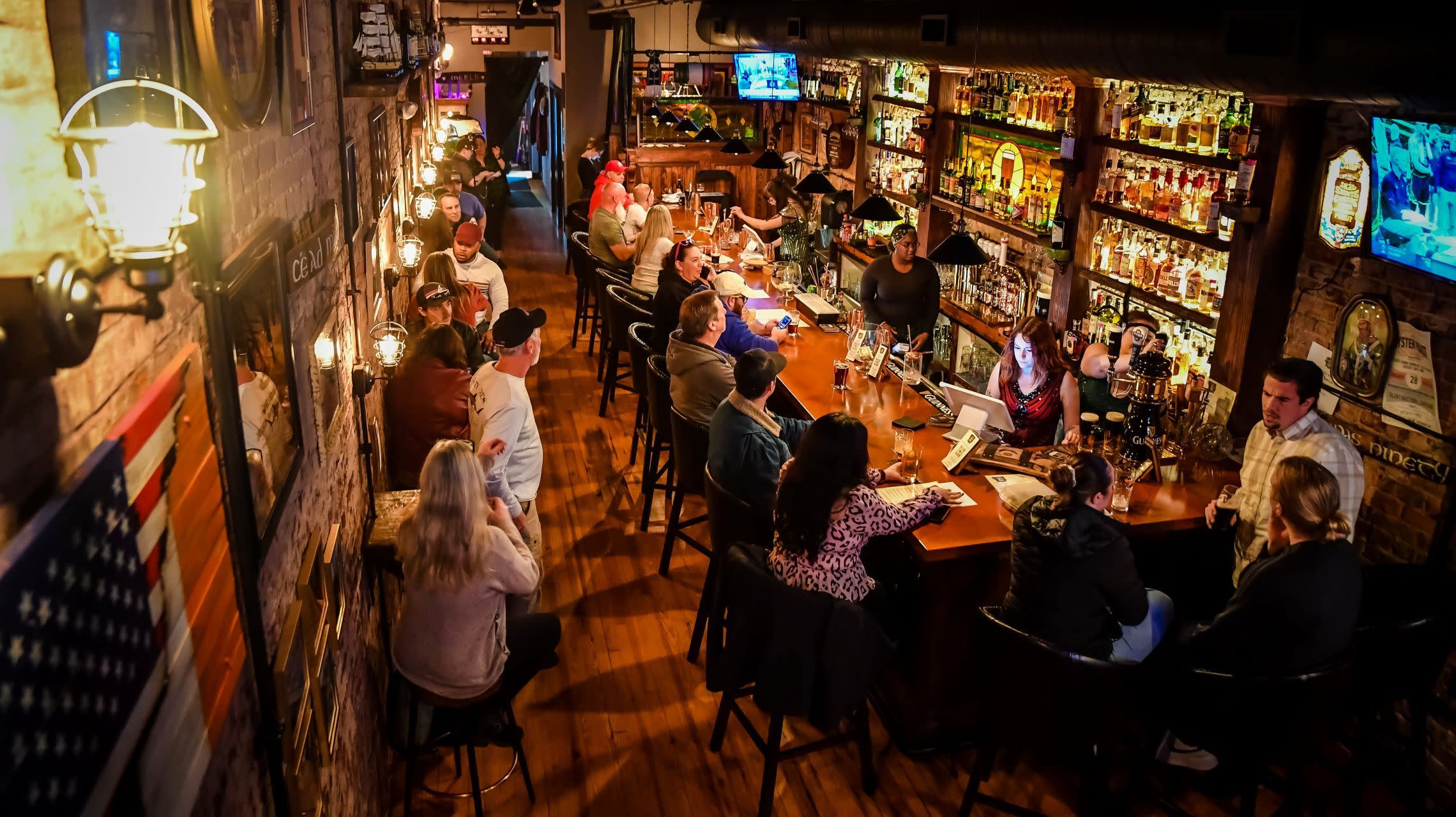 patrons inside Irish pub