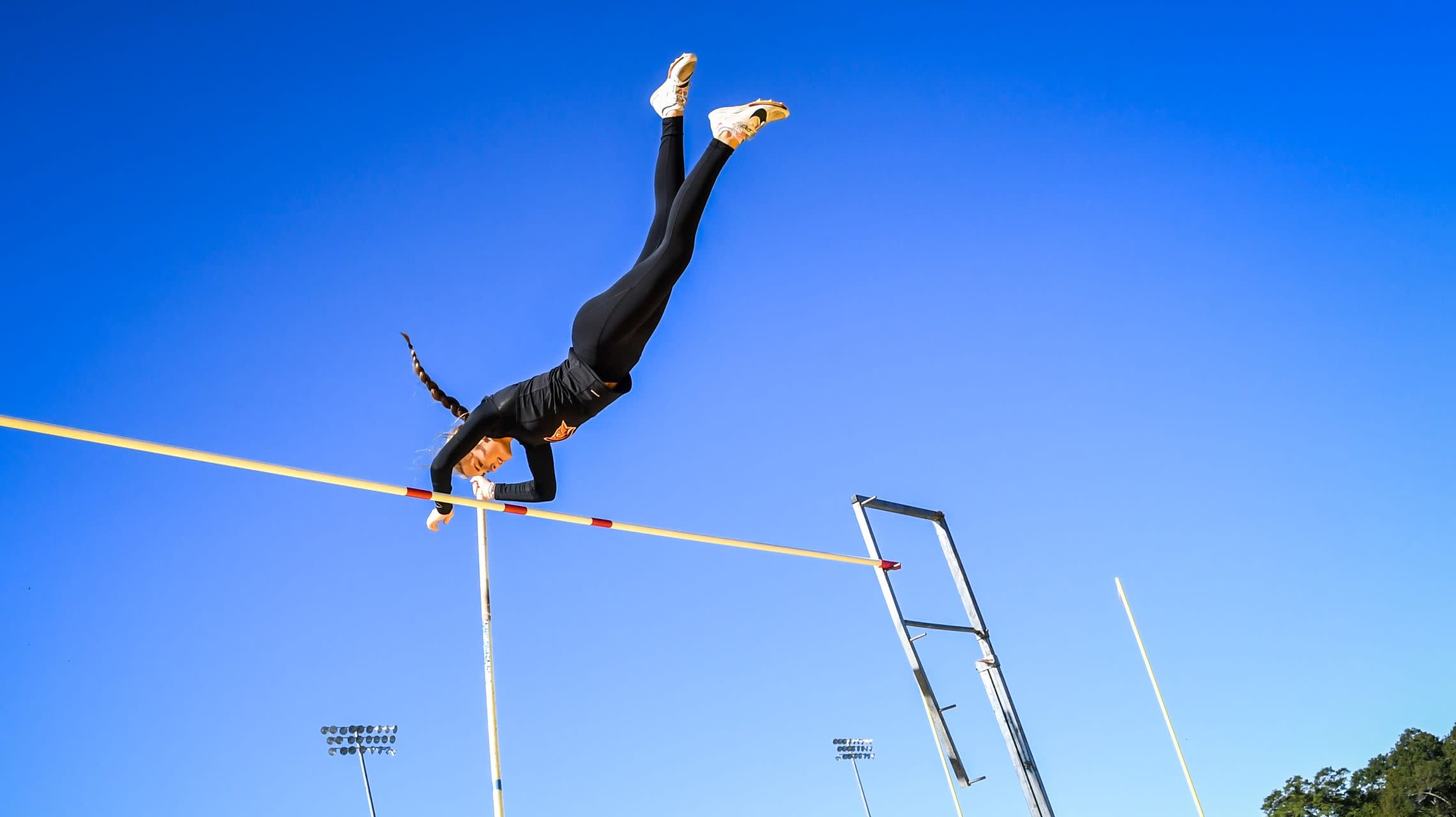 athlete pole vaulting