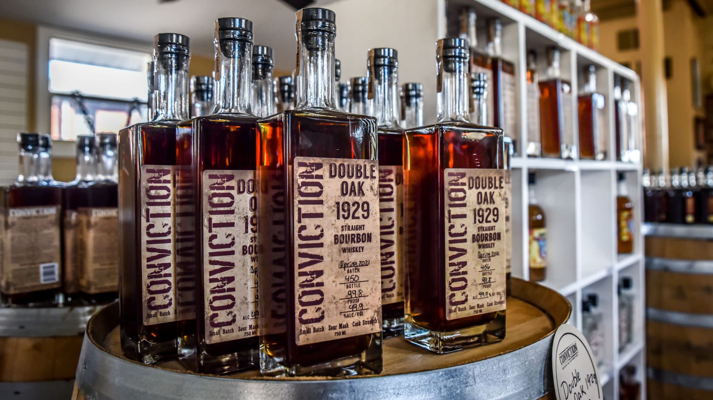 bourbon bottles on display inside gift shop