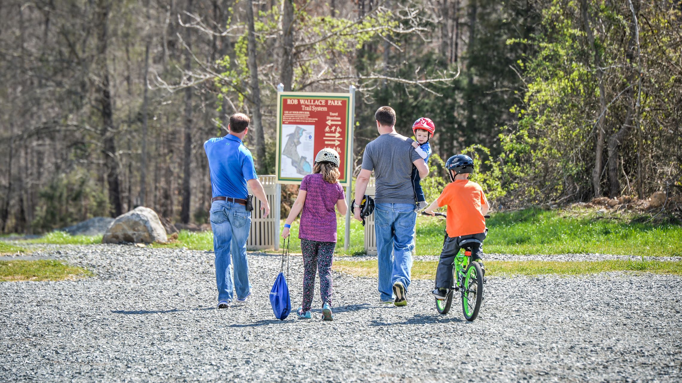 family walking into park