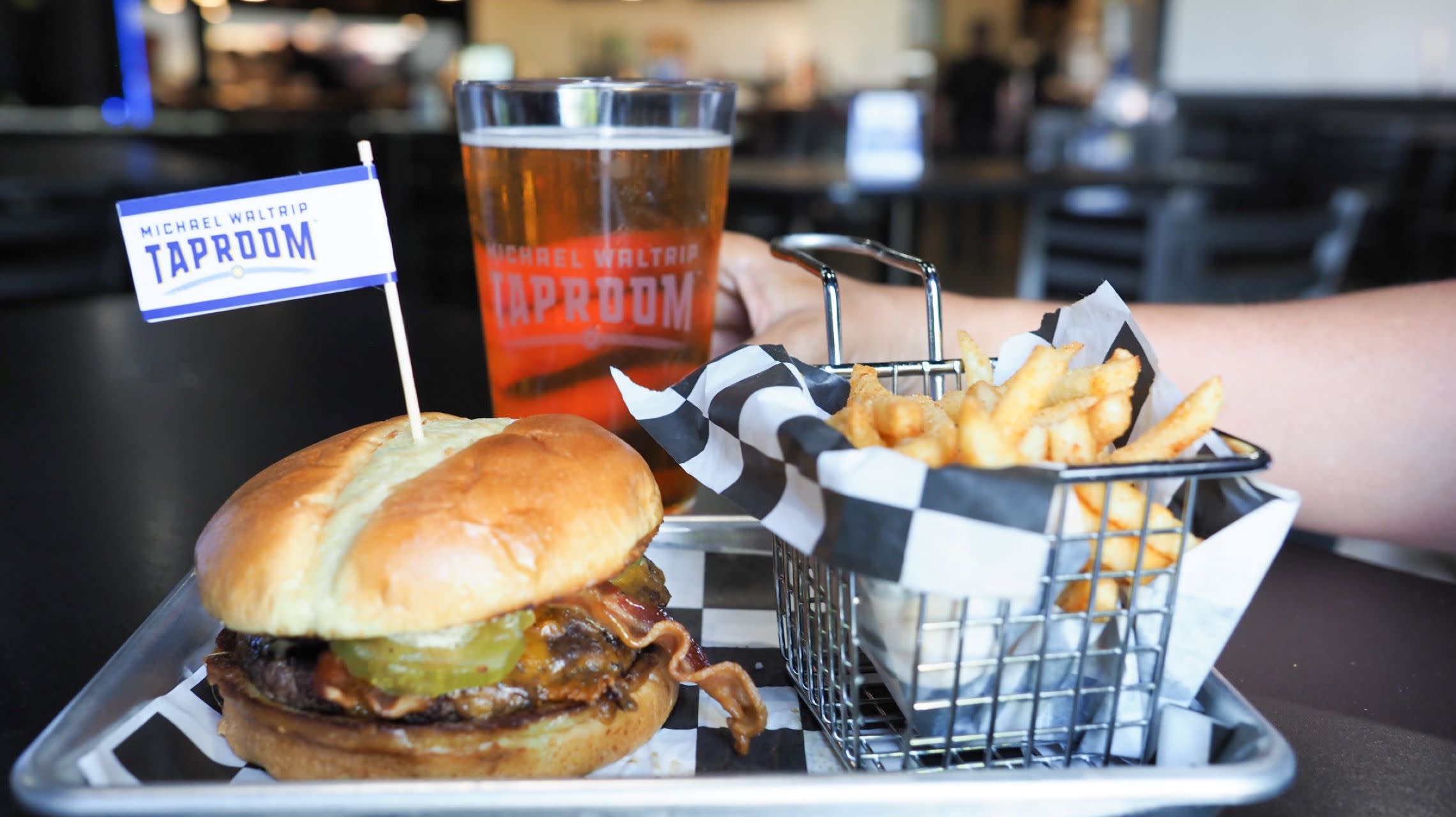 burger, fries and beer on tray