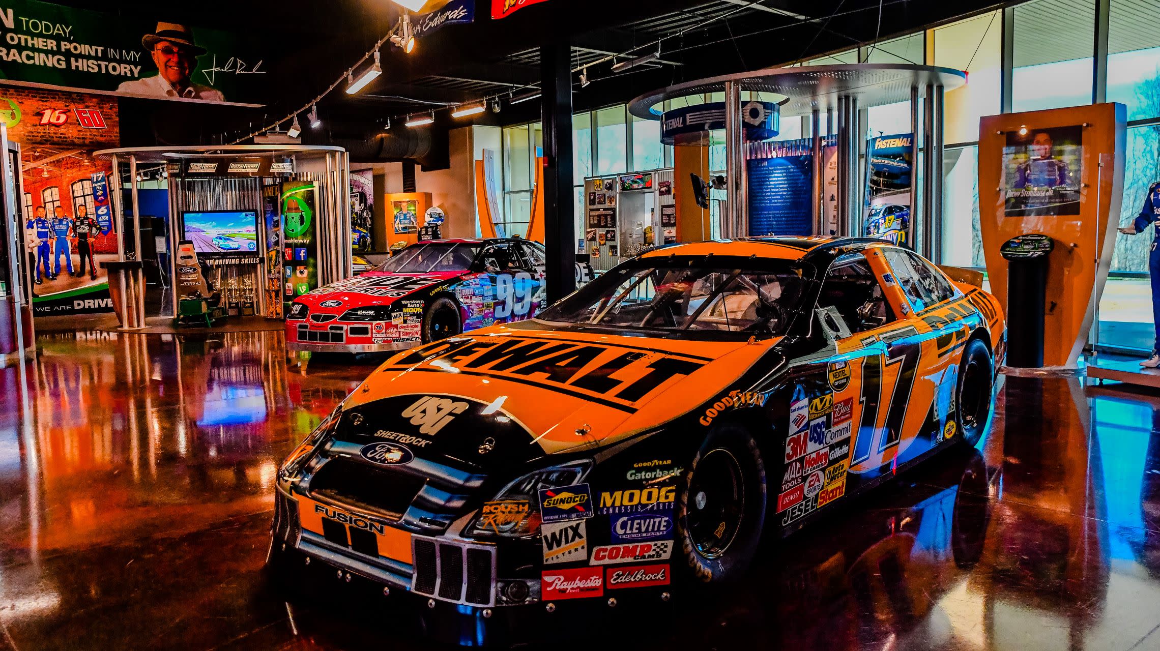 race cars on display inside museum