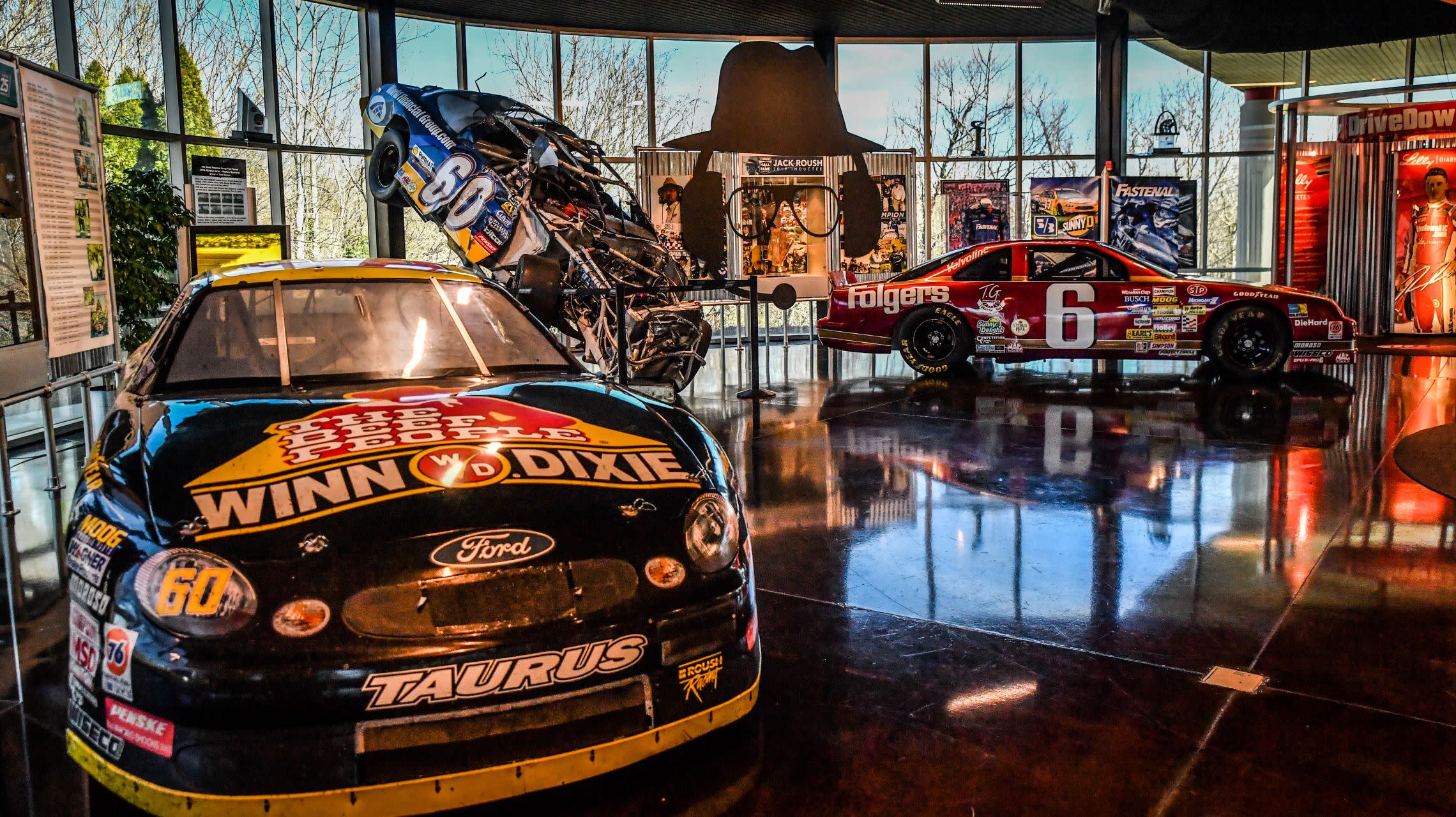 race cars on display inside museum