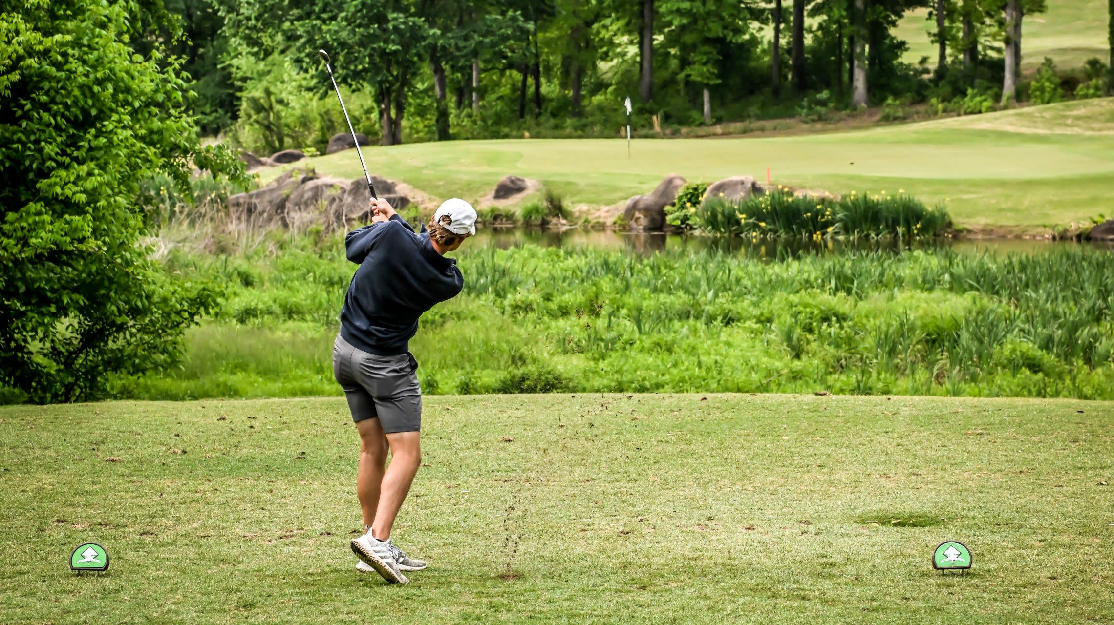 man golfing