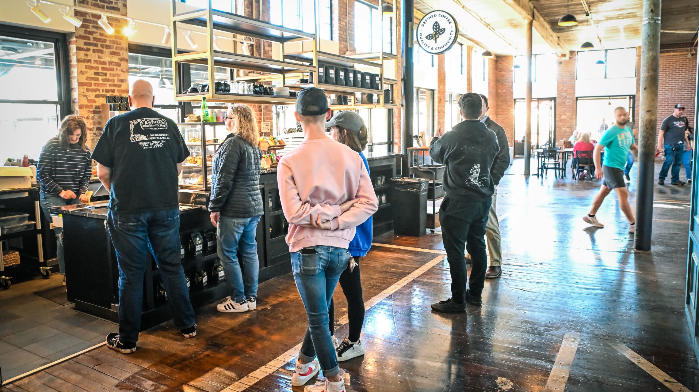 customers order coffee at counter