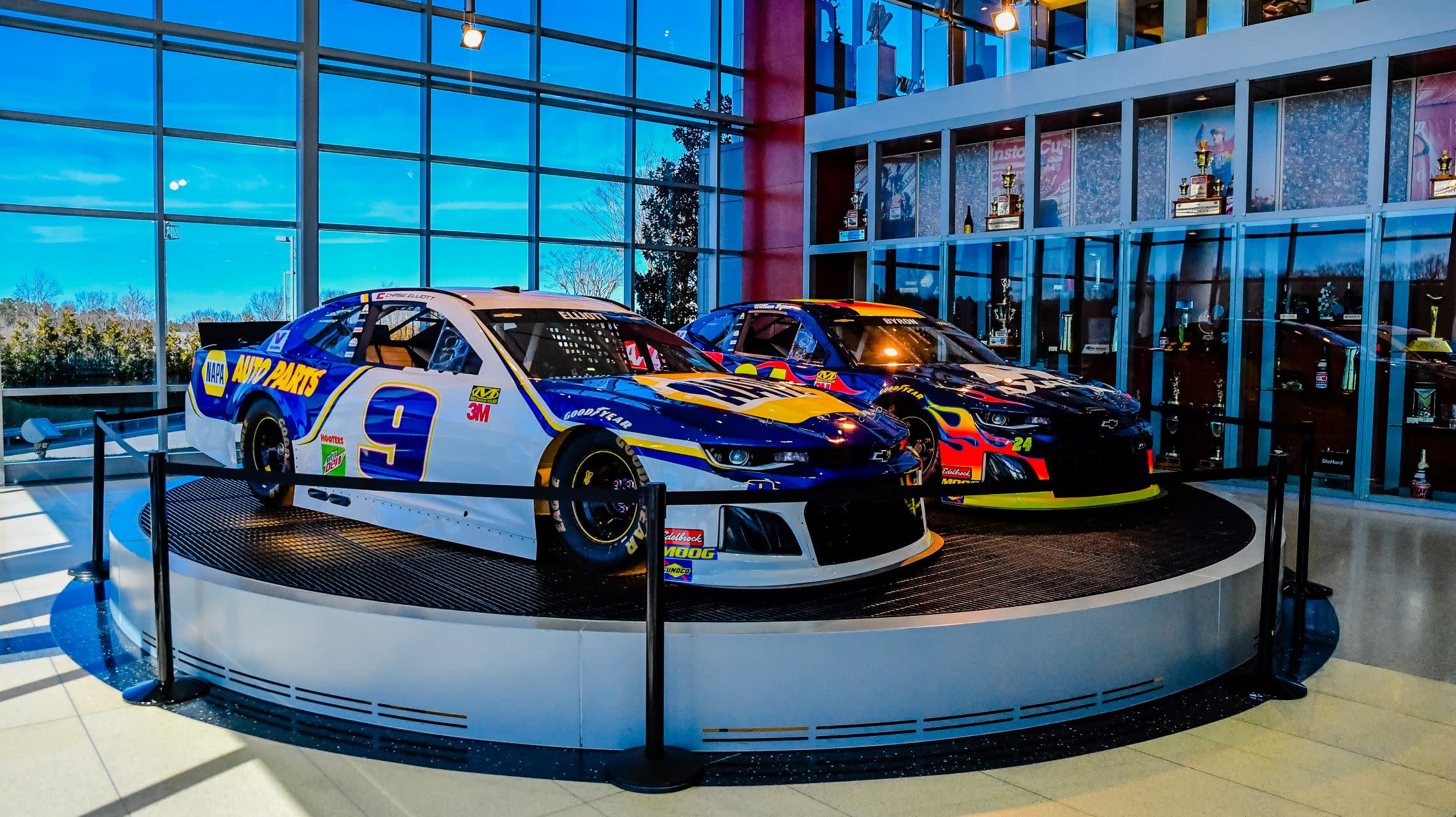 two race cars on display