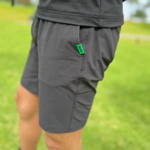 〈NEON GREEN LOGO〉CODURA(R) NYLON 4WAY STRETCH ハーフパンツ MICRO LOGO