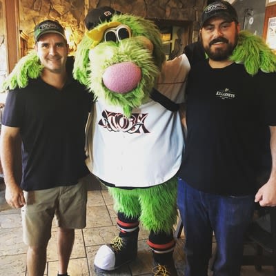 Storm Stadium mascot posing with staff.