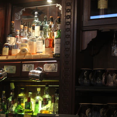 Scotch and other liquors, backlit.