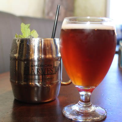 Moscow mule cocktail and a glass of beer.