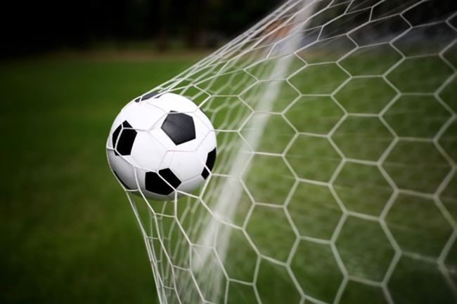 football in the back of the net football in the back of the net