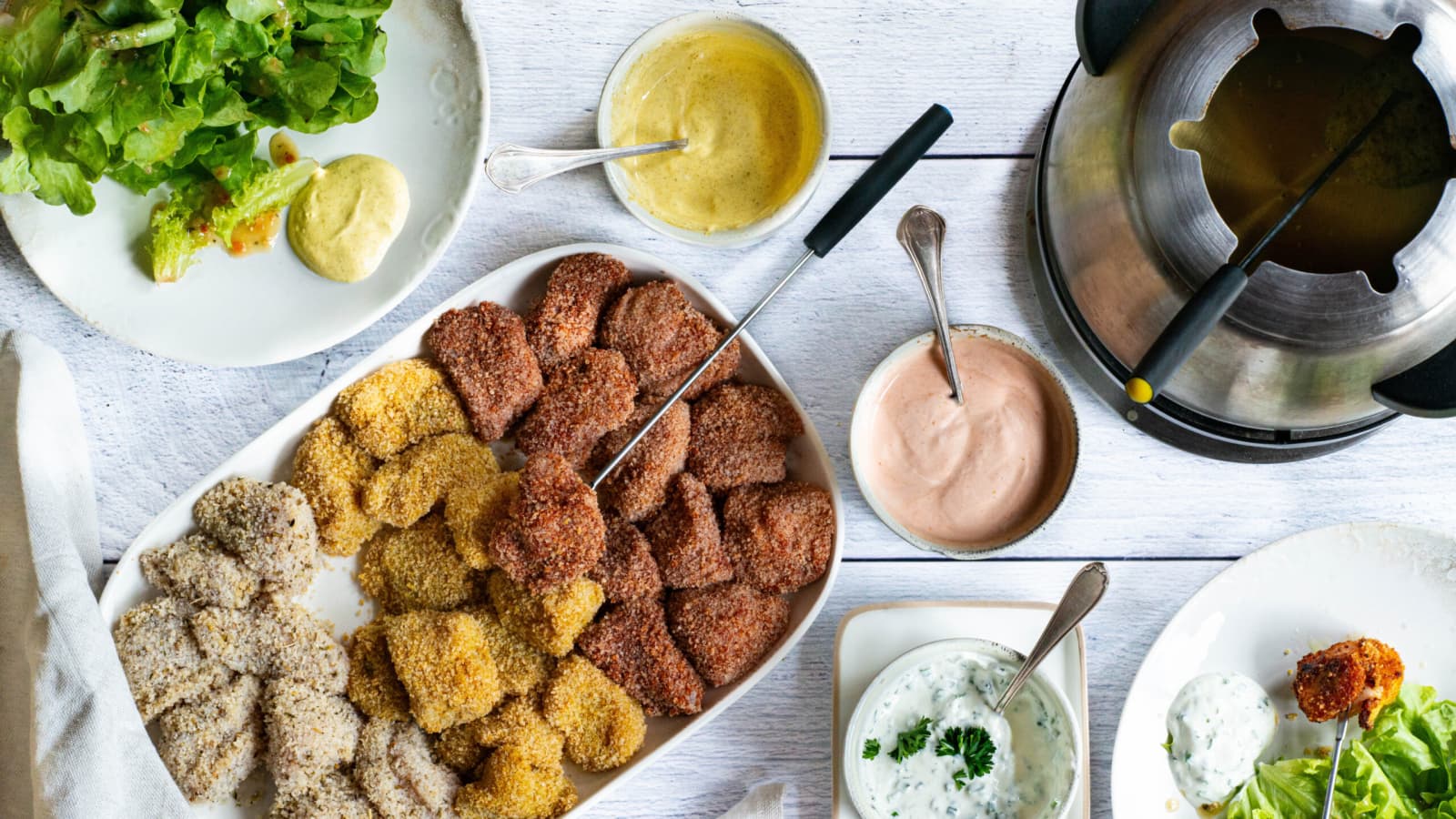 Fondue bressane (paniertes Poulet-Fondue) - Rezept | Swissmilk