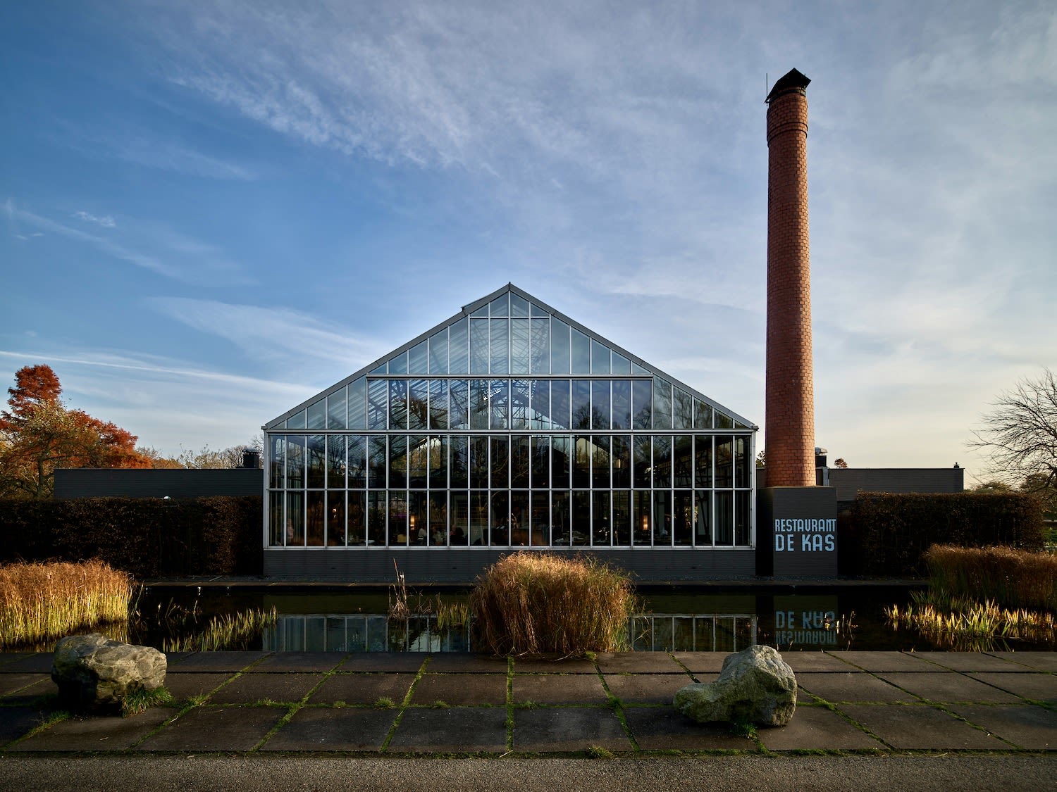 Sustainable restaurant in Amsterdam, de Kas, lets guests eat in a greenhouse in Frankendael Park
