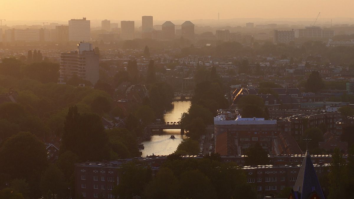 Breathtaking sunset view from best Amsterdam cocktail bar- Twenty Third Bar on the 23rd floor of Hotel Okura