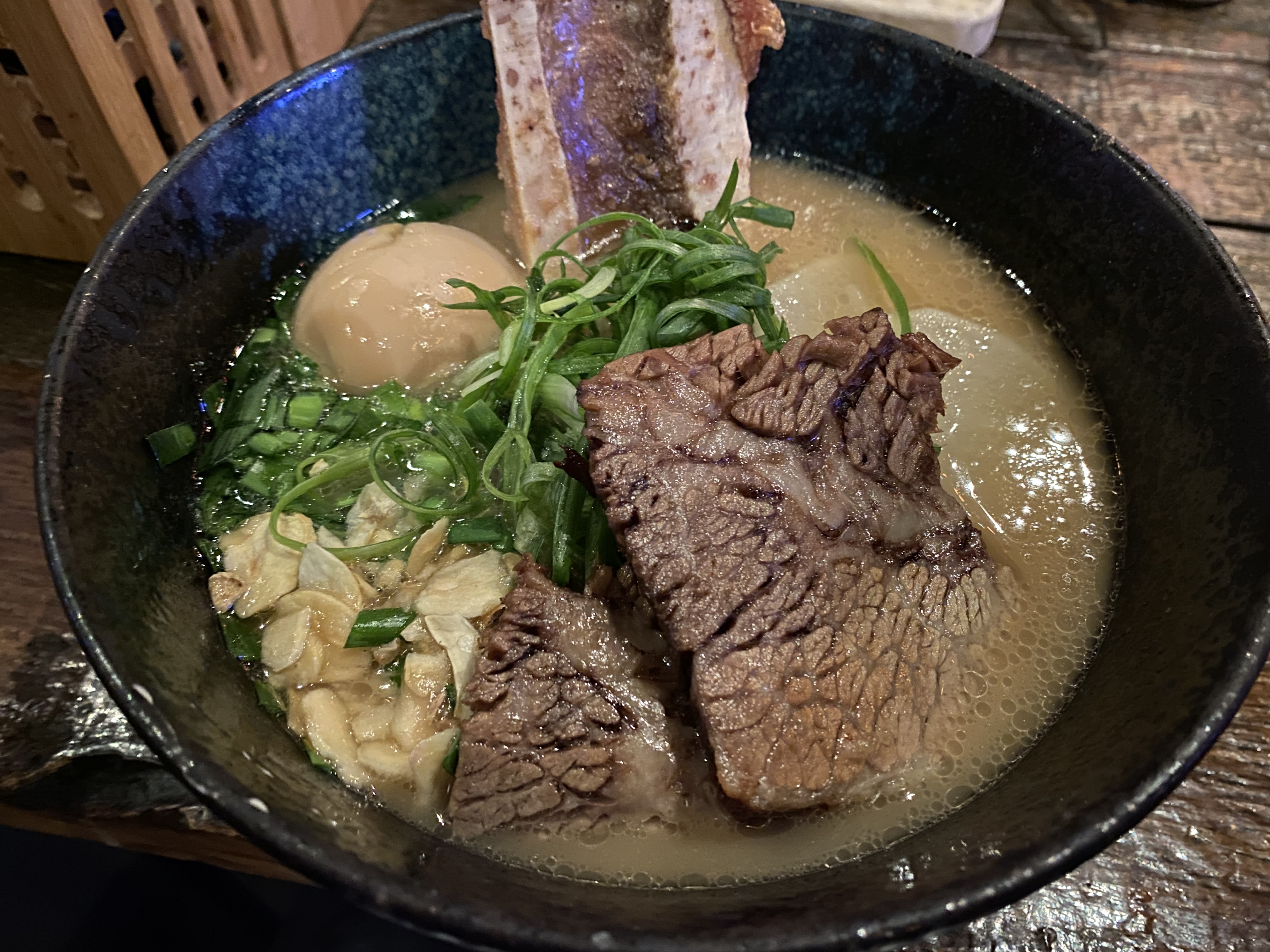 http://res.cloudinary.com/the-infatuation/image/upload/f_auto/q_auto/v1669125912/images/Shinka_Ramen-Beef_Bone_Marrow_Ramen-Kenny_Yang_dthdbb.jpg