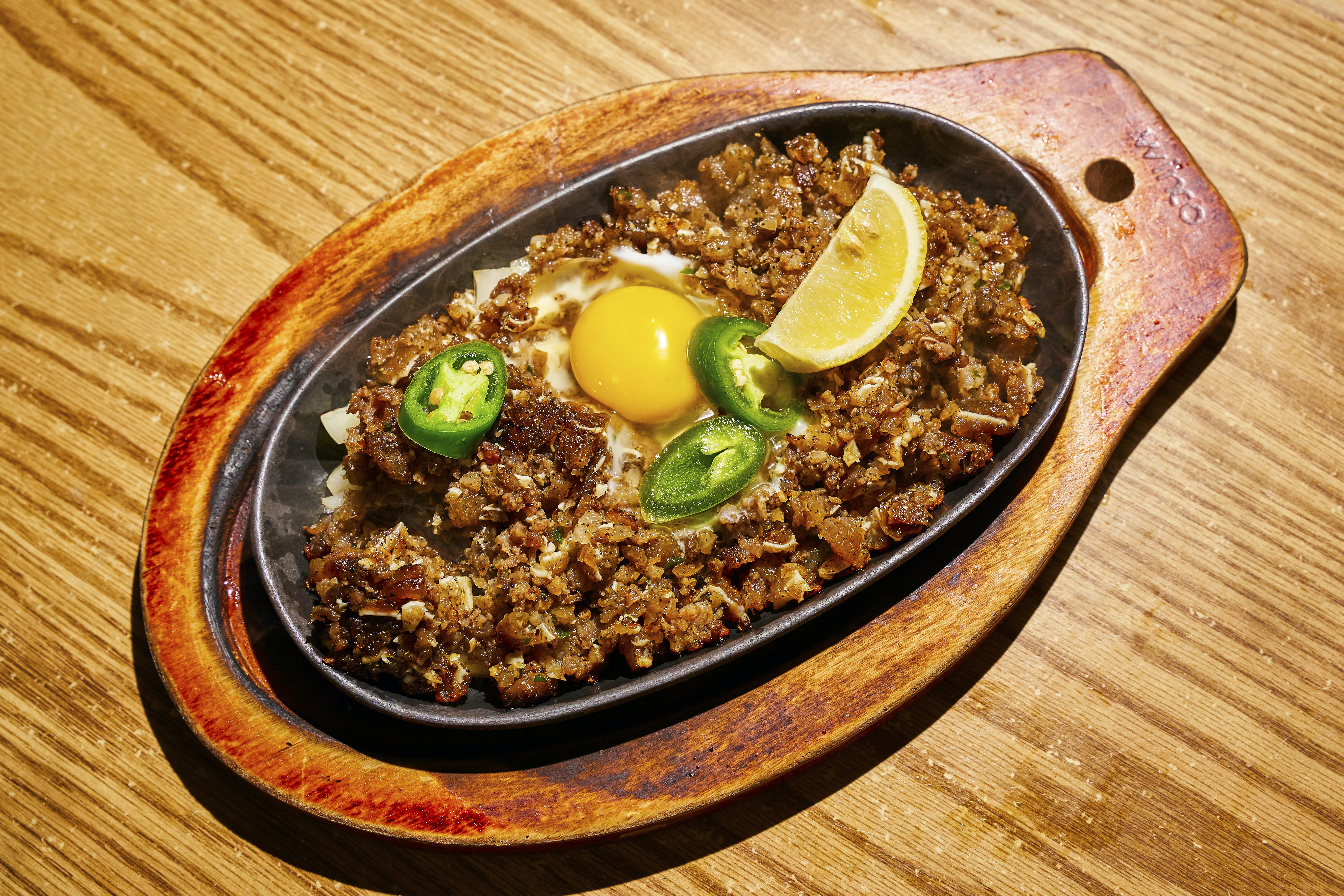 Here's how Ninong Ry elevates his signature sisig and fried chicken dishes