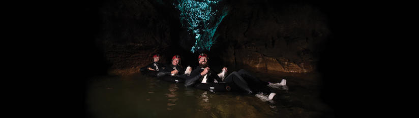 Go black water rafting