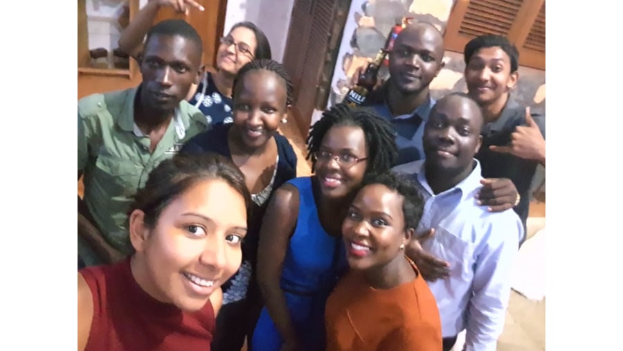 Guests from Mauritius enjoy dinner and and evening with a Kampala family