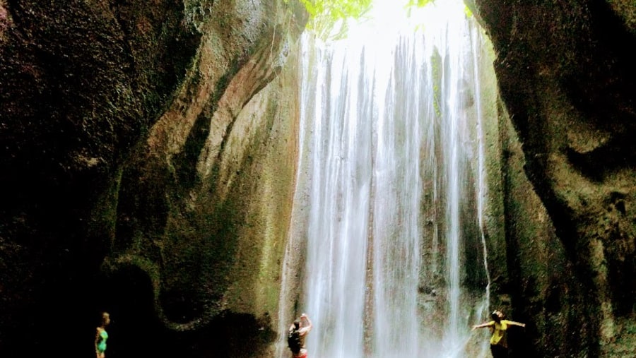 Stop by the Tukad Cepung Waterfall