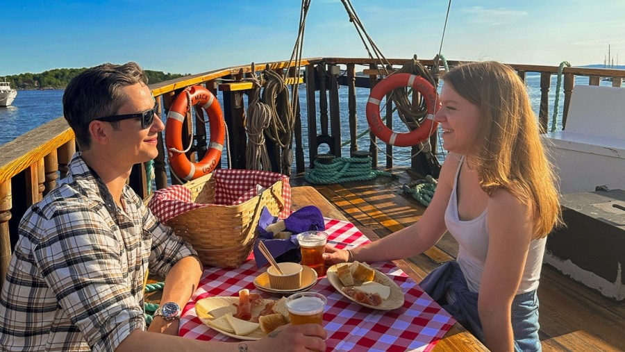 Travellers enjoying Food and Drinks at the Oslofjord Cruise