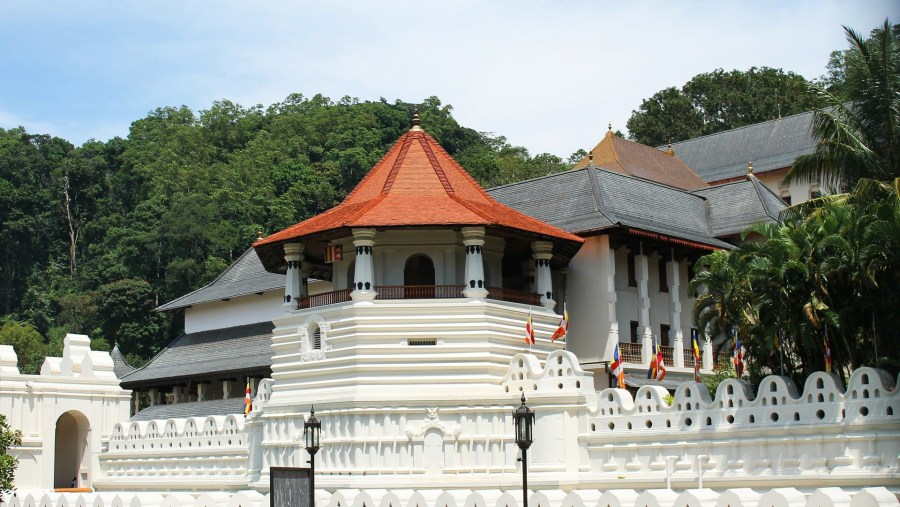 Go to the temple of the tooth relic in Kandy