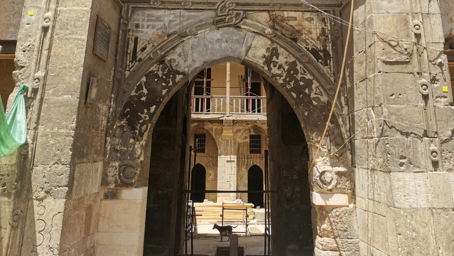 Engraved decorated stone wall with embedded niche in Mamluk era historical mosque of Sultan al Muayyad, Cairo, Egypt