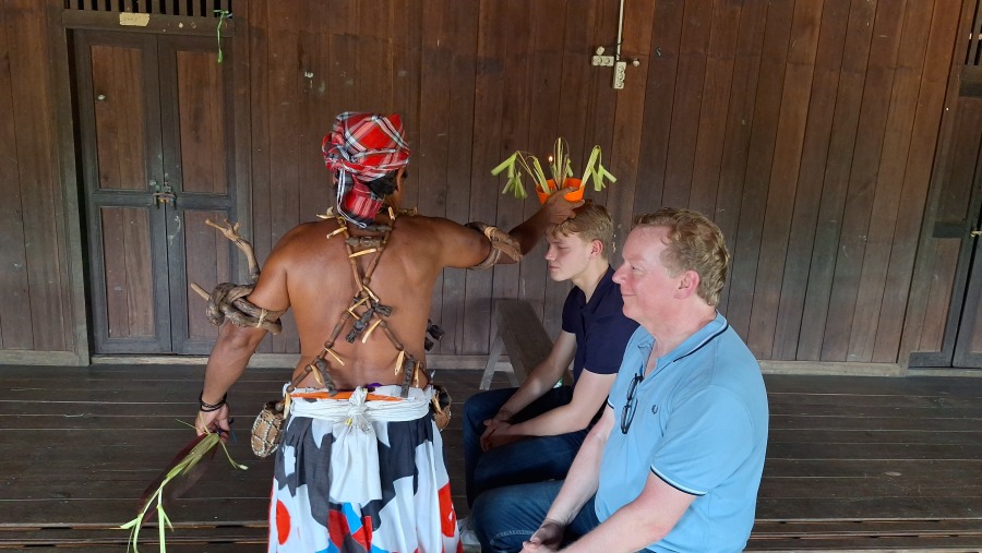 Traveller with a Mancong Villager