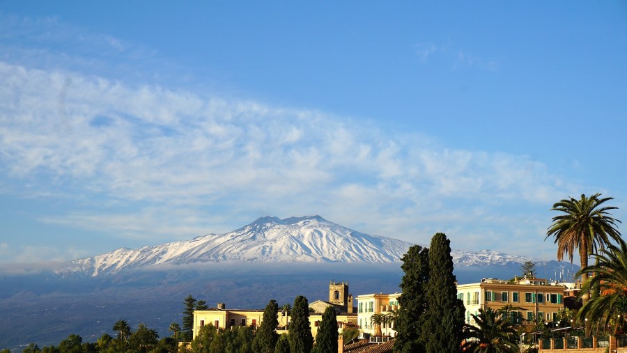 Admire the views of Mount Etna