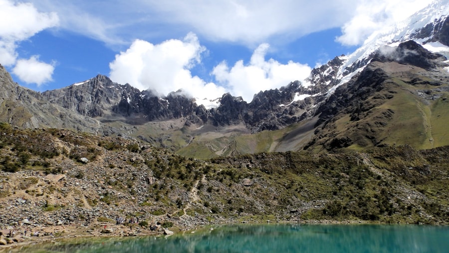 Visit Humantay, sits snugly between Humantay Mountain and Salkantay Mountain