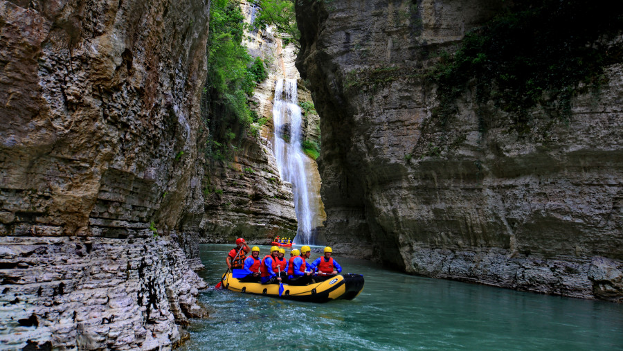 River Rafting by Natural Waterfalls