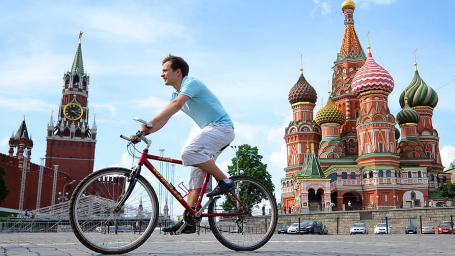 Cycling past St. Basil Cathedral n Moscow