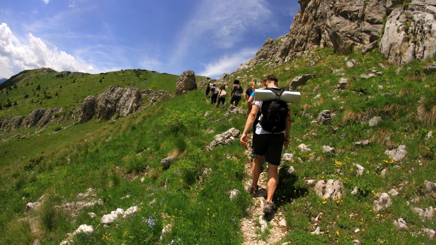 Travellers reaching Hajla Peak