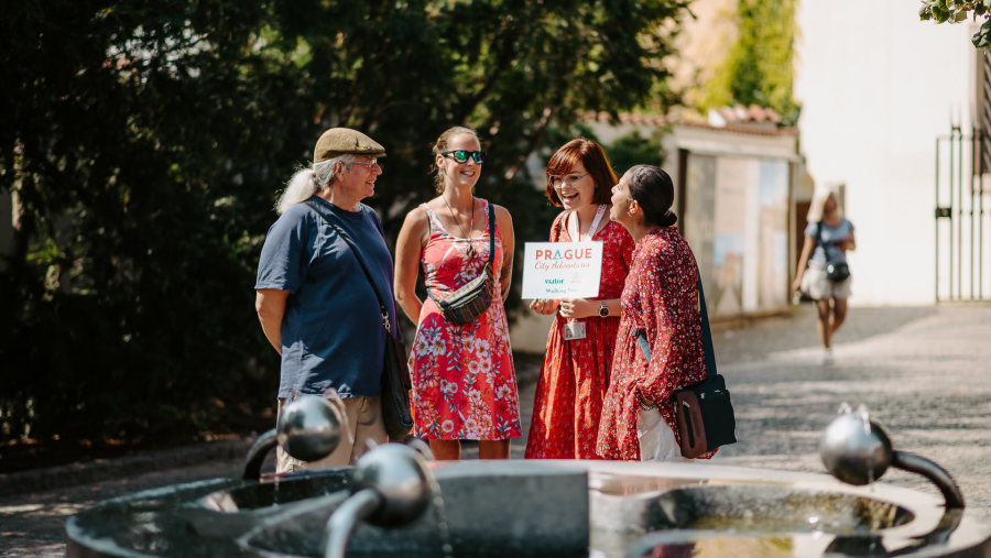 We'll meet you in front of the Malostranska metro station, near a drinking-water fountain.