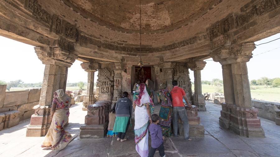 local people visiting temple next to the Chand Baori i.
