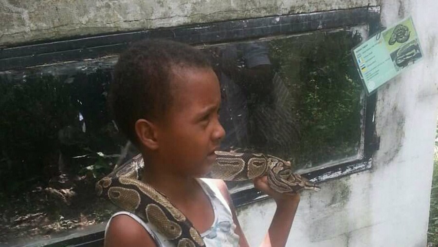 Child With Snake