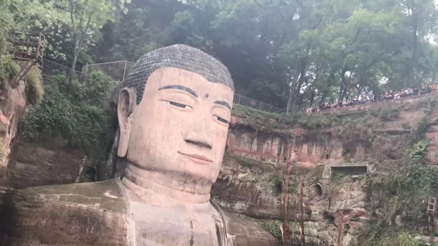 Marvel at the Leshan Buddha