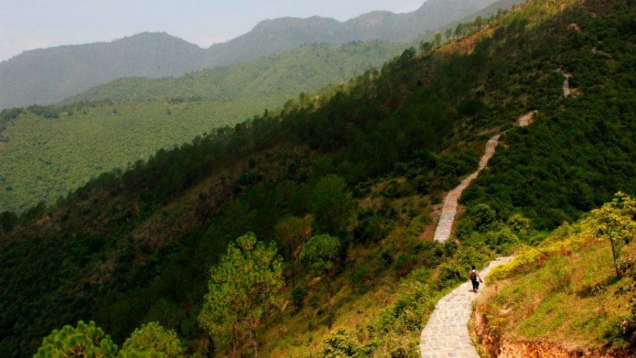 Rocky paths amidst mountain backdrops