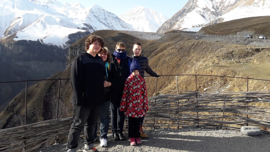 Tourists Posing Infront of Gudauri Mountains
