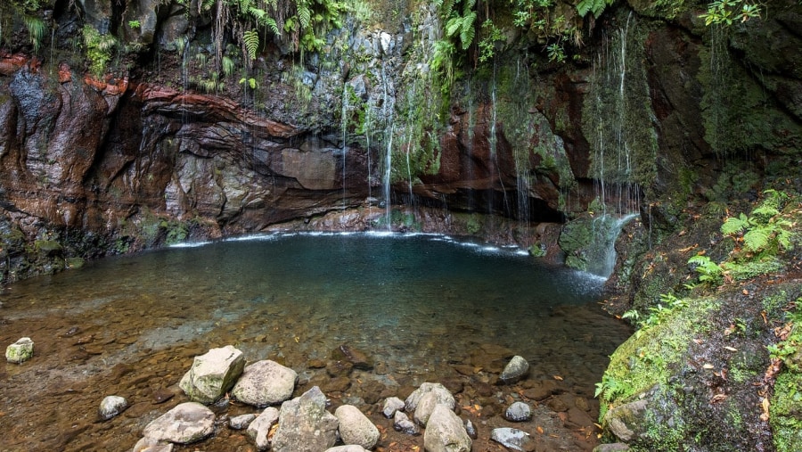 Unwind at the Rabacal Waterfall, one of the most popular in Madeira Island