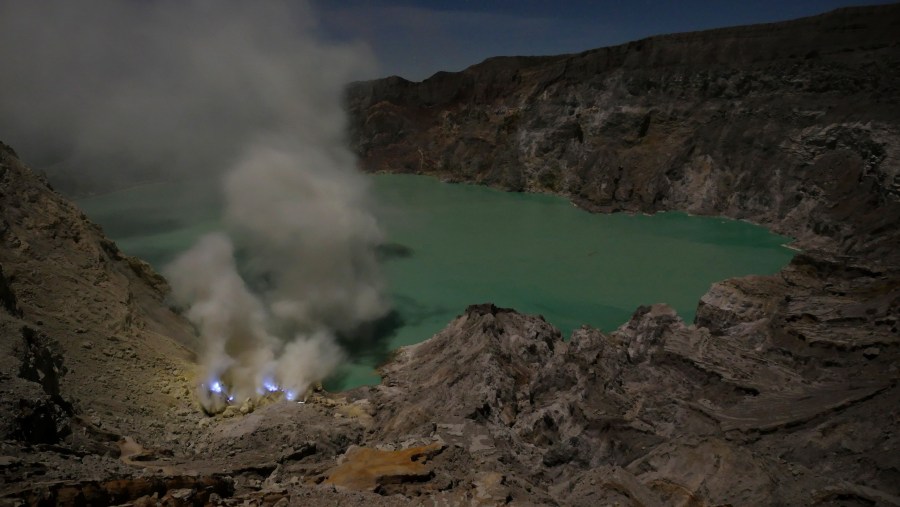 Sulphur burning with Blue Flames at Kawah Ijen