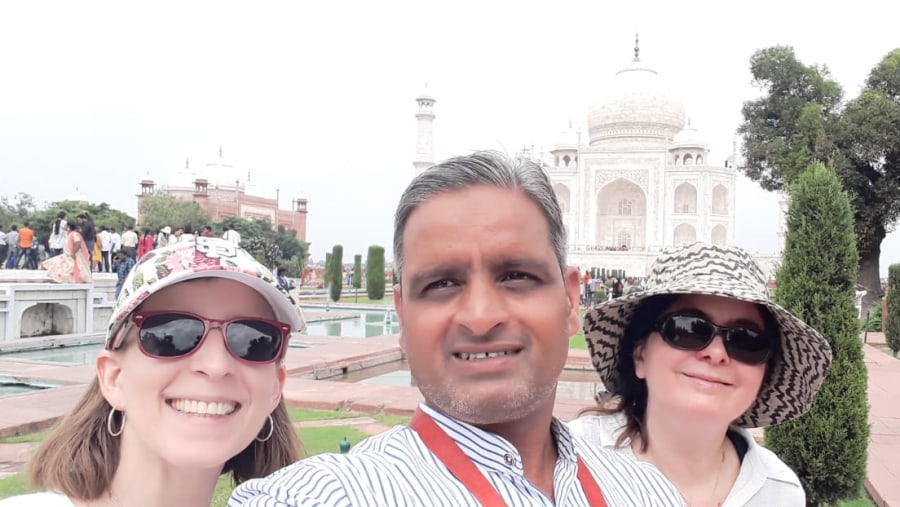 Happy tourists with the guide