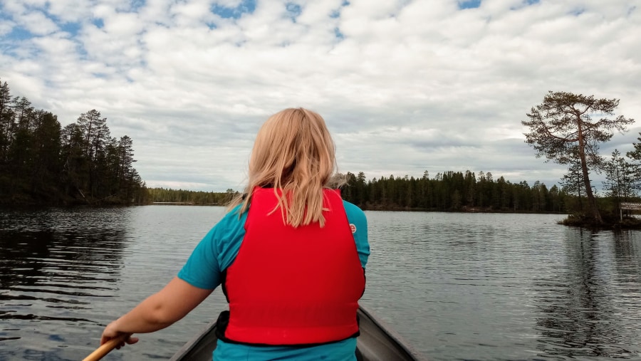 Canoeing in a remote lake in Posio, Finland