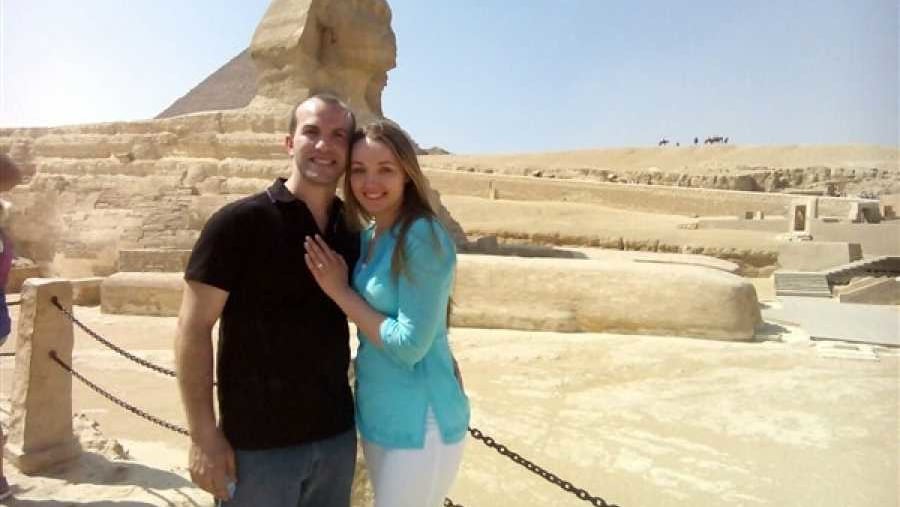 Pose in the front of the Sphinx