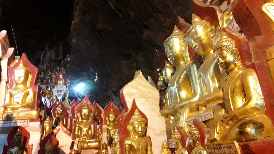 See the Buddha statues in the Golden Cave