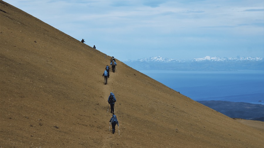 Travellers trekking to the Andean Summit