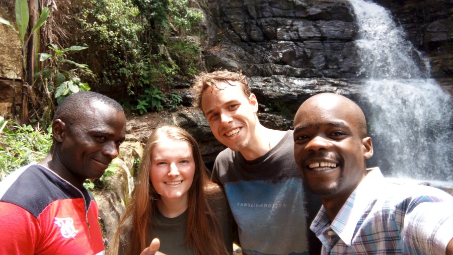 Happy tourists with the guide